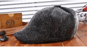 Detail of gray faux fur flat cap for men with soft texture on vintage wood background