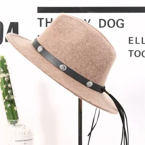 Classic camel wool fedora hat with black leather band and silver metallic accents