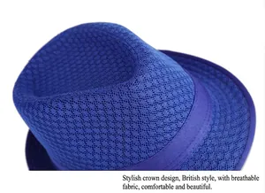 Detailed macro view of the breathable blue mesh fabric on this stylish summer fedora hat