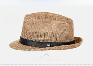 Front view of a brown straw fedora hat featuring a black band and silver metal buckle