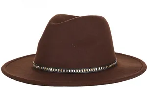 Detailed shot of brown wool fedora hat with black leather belt and metal rivet buckle