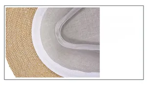 Detail of breathable straw hat interior featuring white fabric lining and neat stitching