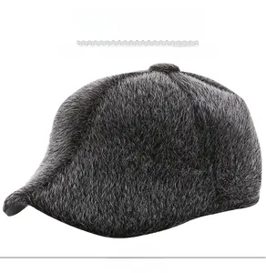 Close-up profile of dark grey faux fur newsboy cap featuring thick plush winter texture