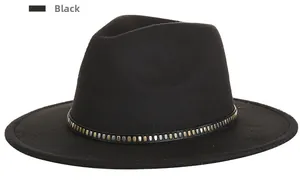 Detail of black fedora hat featuring a thin belt band with gold and silver metal studs