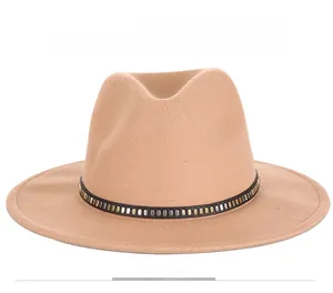 Front view of a camel wool fedora hat featuring a black leather band with gold studs