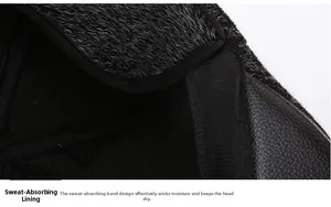 Detail shot of the faux fur lining and black leather piping on the winter ivy cap