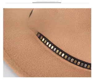 Detail of camel wool felt hat featuring a black leather band with multi-colored metal studs