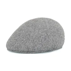 Classic dark grey wool felt flat cap for men and women showing warm winter texture