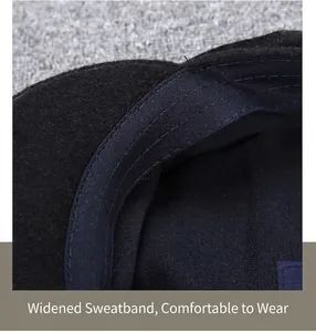 Detailed macro view showing the wide sweatband and stitching inside the wool flat cap