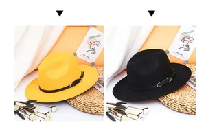 Detail of wide brim wool felt jazz hats in yellow and black with buckle leather bands