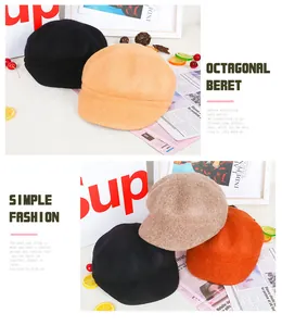Detail view of four wool blend octagonal beret hats in black brown beige and orange