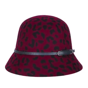 Deep red leopard print wool cloche hat with black decorative leather band and buckle
