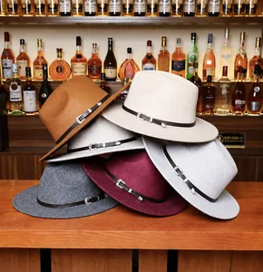 Close-up of wool felt jazz hats with leather belts and engraved silver buckles in five colors