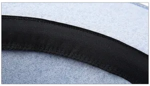 Close-up of light blue wool fedora interior with black sweatband and fine stitching