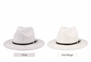 Detail view of taupe and oatmeal wide brim fedora hats with black leather bands