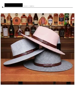 Detail view of stylish wool fedora hats with leather bands in a sophisticated lounge setting