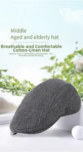 Détail d'un béret en coton et lin gris avec boucle en métal et texture aérée