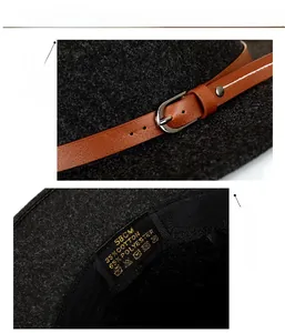Detail of dark grey felt hat with leather strap, metal buckle and 58cm size label