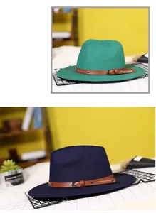 Close-up of wool felt fedora hats with faux leather straps and metal buckle detailing