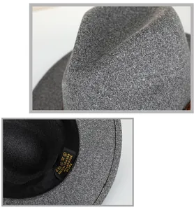 Detail view of grey fedora hat showing felt texture and 58cm label with sweatband