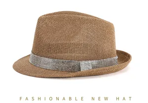 Detail of wide silver rhinestone band on breathable khaki woven straw fedora hat