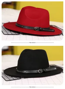 Detail of red and black wool fedora hats with stylish silver buckled leather bands