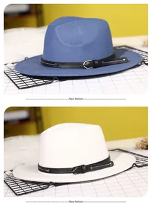 Close-up of wool fedora hat with black leather strap and silver metal buckle details