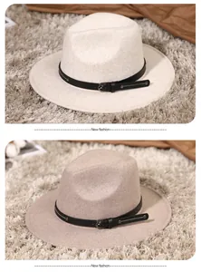 Detail view of stylish wool fedora hats in beige and taupe with black leather bands