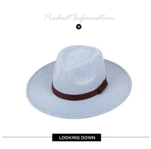 Overhead view of light blue wool fedora hat with brown leather strap and embossed detail