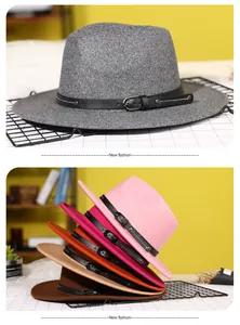 Detail of wool fedora hats in multiple colors with stylish black buckled leather bands