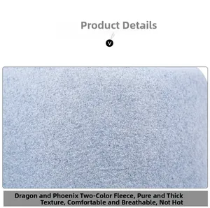 Close-up of thick light blue wool fabric showing dense texture and breathable fiber detail