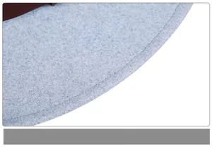 Macro shot of smooth stitching and fine wool felt texture on the brim of a light blue fedora