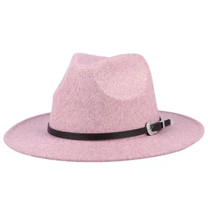 Pink wool fedora hat with wide brim and vintage metal buckle on black leather strap