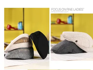 Détail de la casquette plate en lin avec maille respirante et broderie de la lettre R