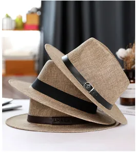 Detailed stack of linen sun hats showing various textures and leather band accents