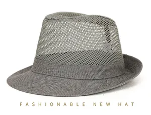 Detail of grey mesh fedora showing breathable crown and woven brim for sun protection
