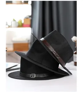 Detail of black linen fedora hats with premium leather bands and metallic buckle closure