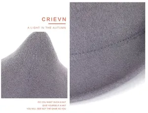 Detailed macro view of gray wool felt witch hat showing fine texture and single-stitch seam