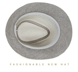 Detailed interior view of grey breathable mesh sun hat with white sweatband and woven texture