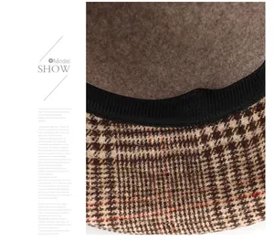 Detailed close-up of houndstooth wool hat with soft felt lining and inner sweatband