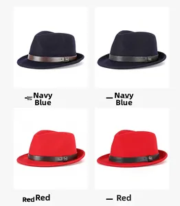 Detail view of wool fedora hats with M-metal badge on leather bands in navy blue and red