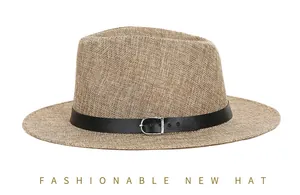 Detailed close-up of woven straw texture with black leather band and silver buckle