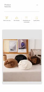 Detail showing wool beret with large ribbon bow and pearl accents in vintage French style
