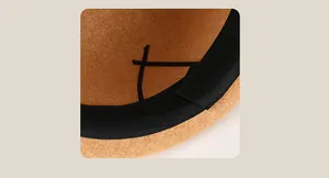Detail view of the interior with black sweatband and adjustable drawstring for wool hat