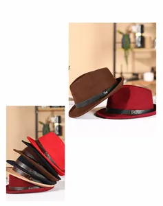 Detail of wool fedora hats featuring stylish leather bands and metallic M emblem accents