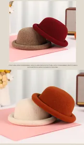 Detail view of wool knit bowler hats in brown, burgundy, cream and caramel colors