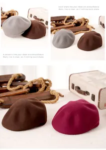 Detailed view of three wool octagonal newsboy hats in grey, brown and burgundy colors