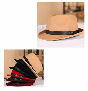 Detail of wool fedora hat with elegant leather band and metal M-letter decorative buckle