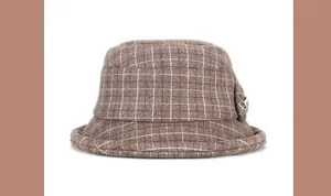 Detail of brown plaid wool bucket hat with decorative handmade flower and bead accents