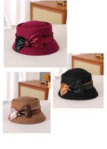 Three elegant wool felt cloche hats in burgundy, black and camel with ribbon bows